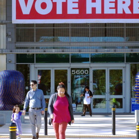 Voters walk in front of the Registrar of Voters on Election Day on June 2, 2026.