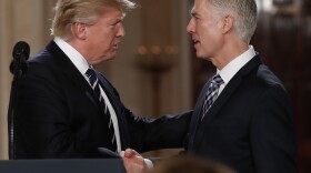 President Donald Trump shakes hands with 10th U.S. Circuit Court of Appeals Judge Neil Gorsuch, his choice for Supreme Court Justices in the East Room of the White House in Washington, Tuesday, Jan. 31, 2017. 
