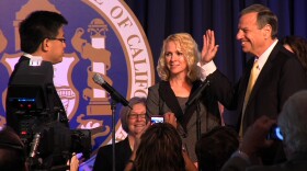 Filner standing next to his now ex-fiancee Bronwyn Ingram while being sworn in by California Controller John Chiang.