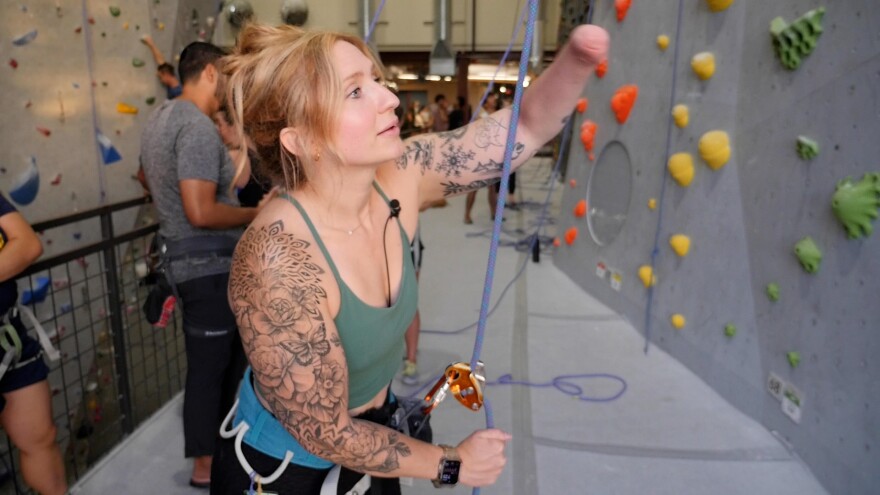 Jillian Shea belays Abdul Rahman Ibn Asadullah at the Mesa Rim Climbing Center on August 7, 2024. 