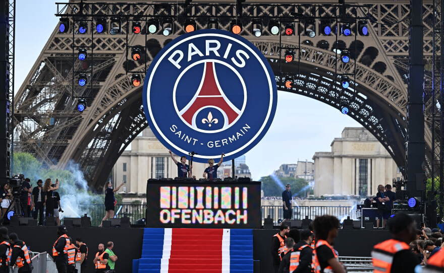 Artists perform ahead of PSG's celebrations the day after winning the Champions League title, at the Eiffel Tower, in Paris, Sunday, May 31, 2026.