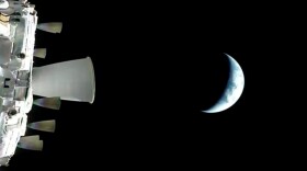 In this photo provided by NASA, a view of the Earth from NASA's Orion spacecraft during the Artemis II test flight on Thursday. The crew successfully completed a key burn, sending the capsule speeding to the moon for a lunar flyby.