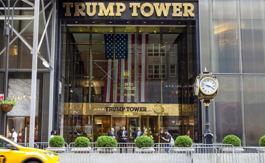 A taxi passes by Trump Tower, the headquarters of the Trump Organization, in New York City in 2021.