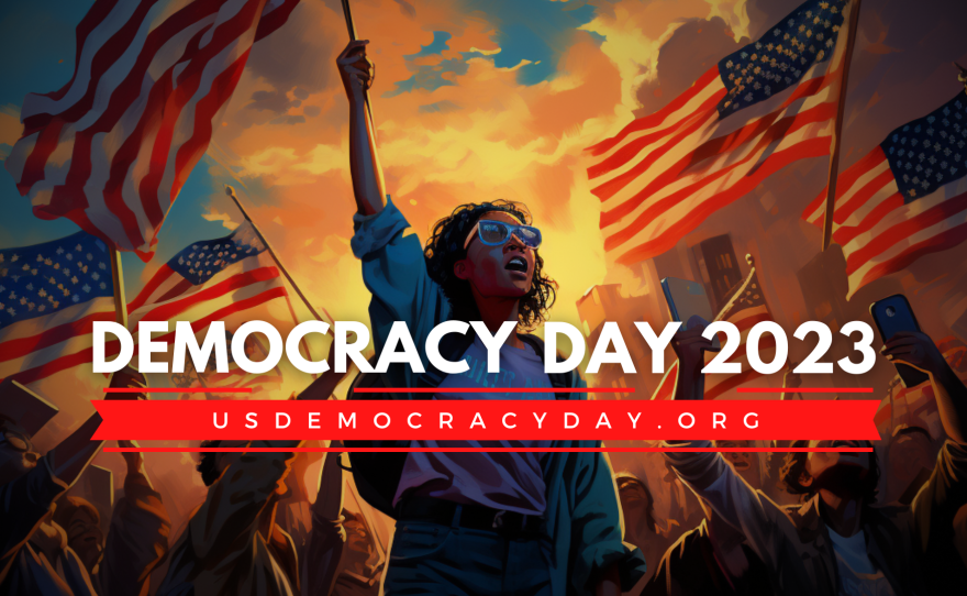 A graphic image showing multiple people holding American flags with the following overlay text: "Democracy Day 2023" and "usdemocracyday.org."