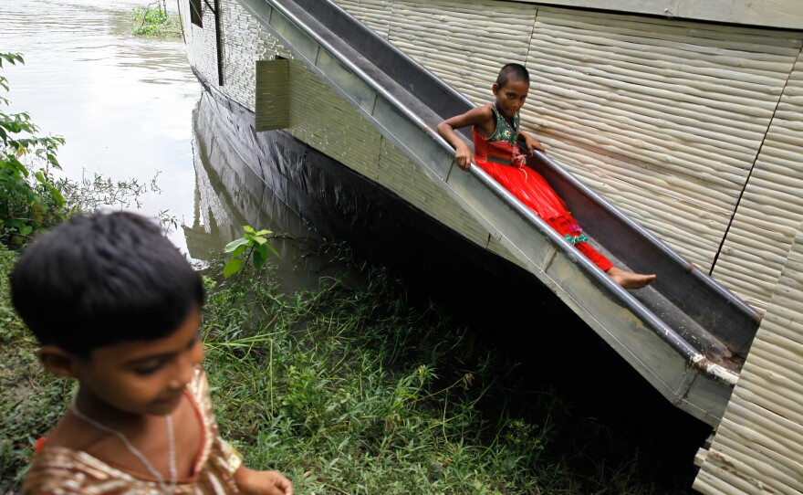 The floating library also has a playground with a slides on either side of the boat and a swing set on the top deck.