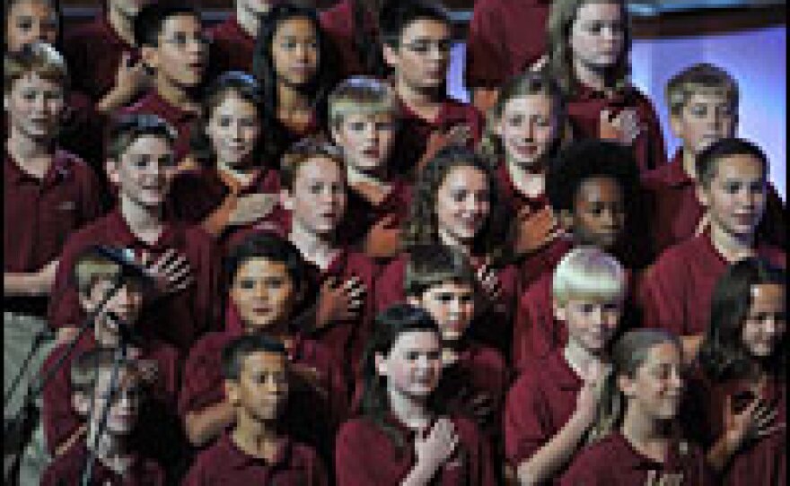 The Colorado Children's Chorale sings the national anthem at the convention's opening.