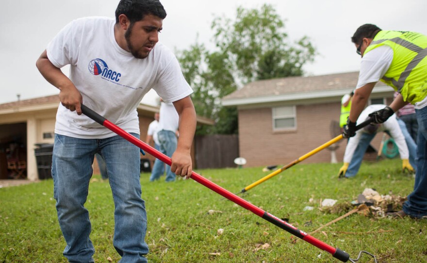 Mynor Sanchez, a resident of Moore, Okla., lives a few blocks away and three houses down from major destruction. He is volunteering Friday in the neighborhood with his church, Templo El Alabanza, trying to do any tasks with which residents need help.