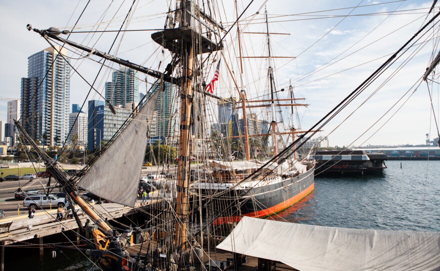 Two Maritime Museum vessels, the HMS Surprise in front and the Star of India behind it, sit in the San Diego harbor. Feb. 16, 2017.