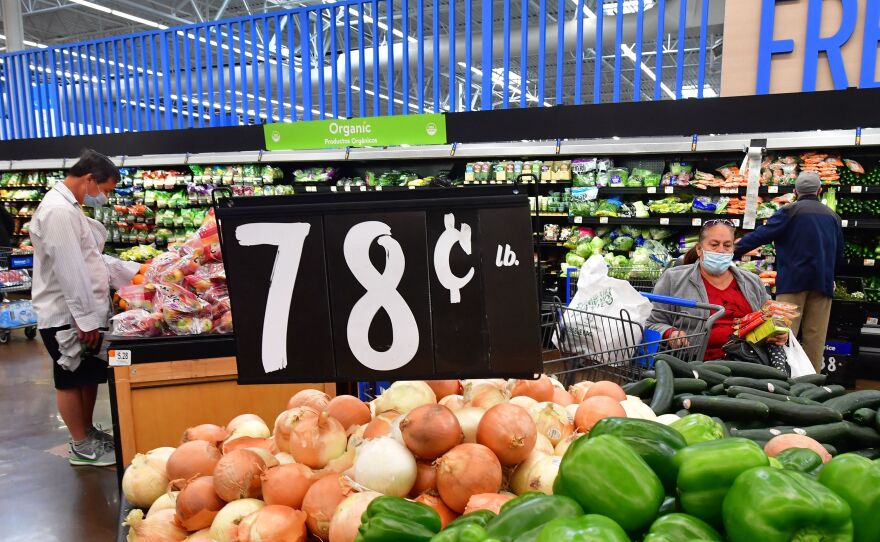 Prices for groceries have surged as inflation has hit its highest level in four decades. Here, prices are displayed at a supermarket in Rosemead, Calif., on April 21.