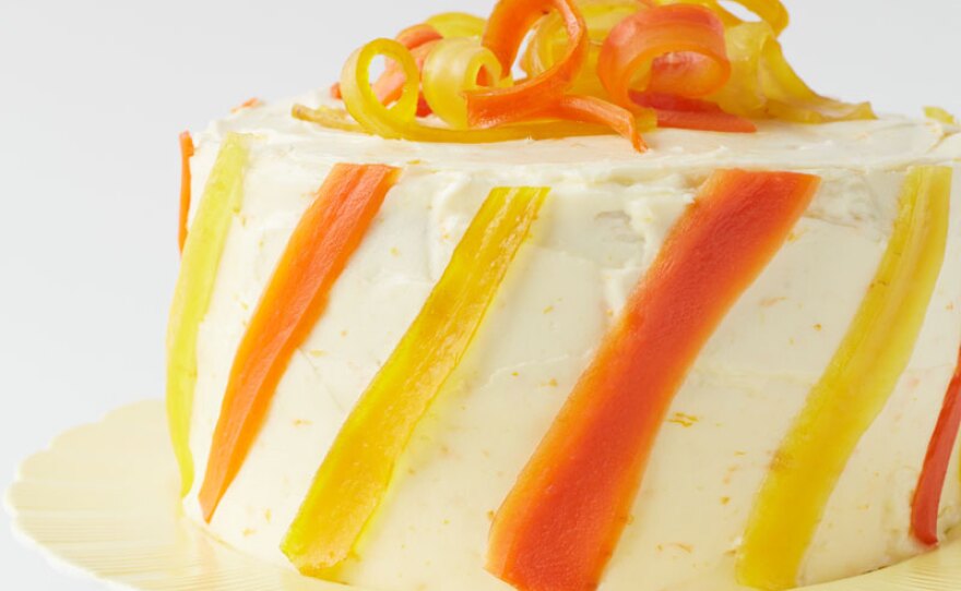 Martha demonstrates how to transform carrots into brilliantly colored finishing touches for this delectable carrot cake with a heavenly orange cream cheese frosting.