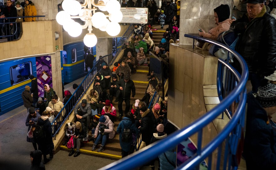 Civilians take shelter in Akademmistechko Metro during an air alert on Monday in Kyiv, Ukraine. Russia renewed its missile attacks across Ukraine on Monday.