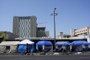 Tents are lined up on Skid Row Thursday, July 25, 2024, in Los Angeles.