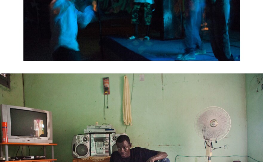 At a friend's house, Alioune Diop, who goes by CLD, pours a cup of sweet green tea. Below: A rapper who fled the civil war in Guinea Bissau. He believes music will improve his life.