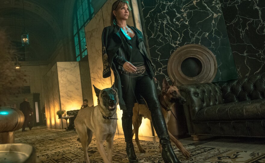 Sofia (Halle Berry) and her very impressive attack dogs in "John Wick: Chapter 3 -- Parabellum."