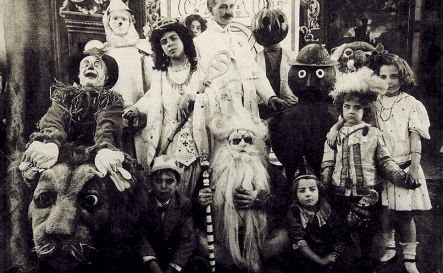 L. Frank Baum (center) surrounded by characters from The Fairylogue and Radio-Plays, a traveling multimedia Oz stage show. Circa 1908.