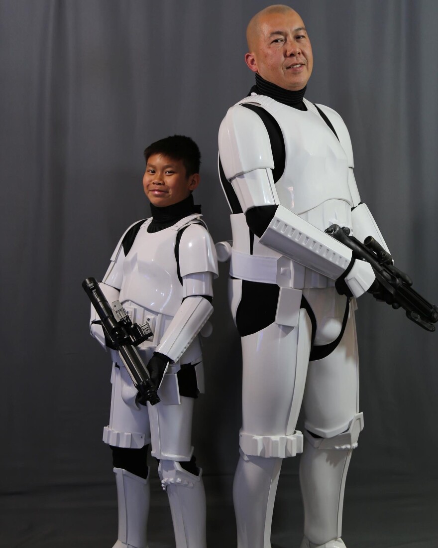 Ermer Michelle Twaño and his son in their stormtrooper gear.