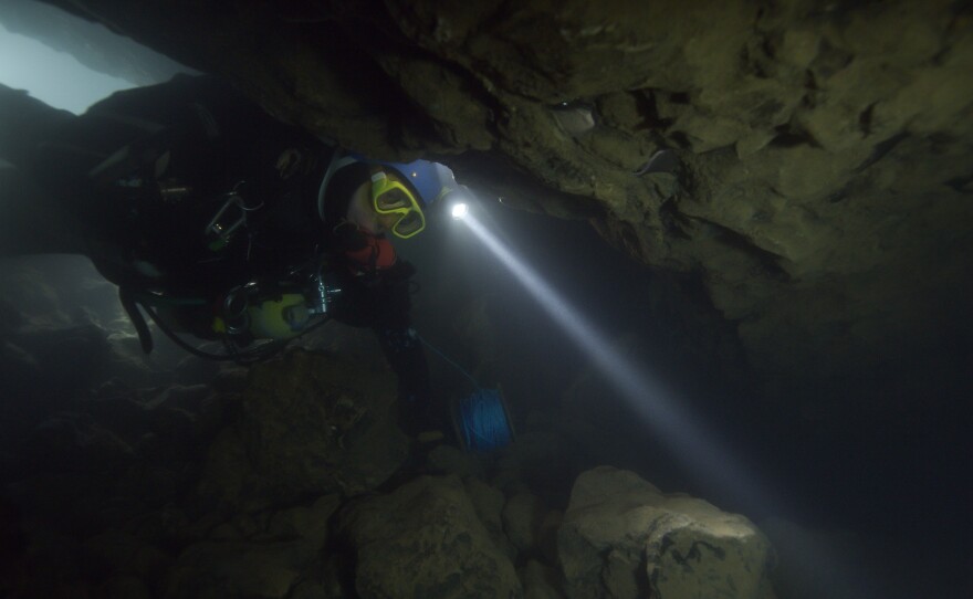 Rescue divers could barely see in front of their faces while searching the cave underwater for the 12 boys and their coach.