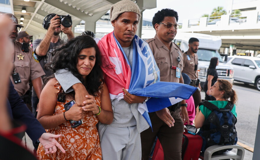 Cuban dissident artist Luis Manuel Otero Alcántara arrives at Miami International Airport on Saturday, July 18, 2026, after serving a five-year prison sentence in Cuba.