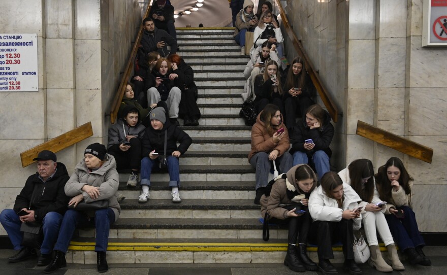 Kyiv: People take shelter in a subway station as they wait for the end of another air alarm after a Russian missile attack.