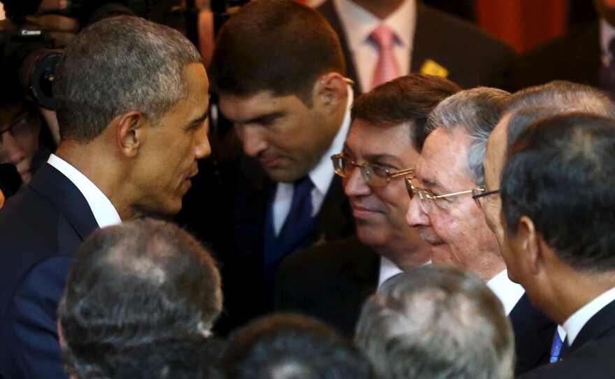 President Obama talks with Cuban counterpart Raul Castro before Friday's inauguration of the VII Summit of the Americas in Panama City.