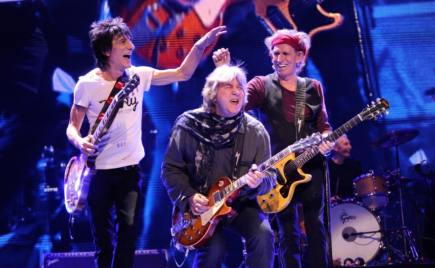 Mick Taylor (C), Ronnie Wood and Keith Richards of The Rolling Stones perform at the Prudential Center on Dec. 15, 2012 in Newark, New Jersey.
