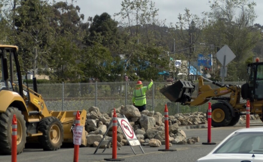 Oceanside city crews bulldoze large rocks along South Oceanside Boulevard to prevent homeless encampments from forming again. April 14, 2021.