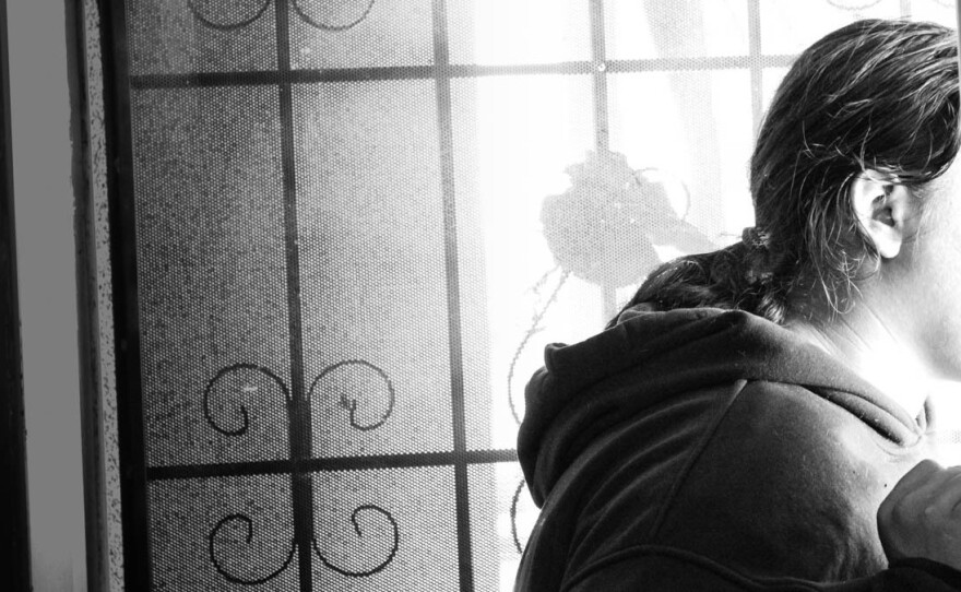 This 18-year-old man was placed on probation after stealing sneakers at age 15. He stands in his front door in Alameda County, Calif., to demonstrate the limited range of movement allowed by the electronic monitoring device he was required to wear. "It felt like I was on a dog leash," he says. Violations related to it sent him to juvenile hall multiple times.
