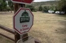 A sign on the road in Green Oaks Ranch warns of camp in session on June 10, 2024, in Vista, Calif. The property often hosts retreats for foster youth and other vulnerable populations.