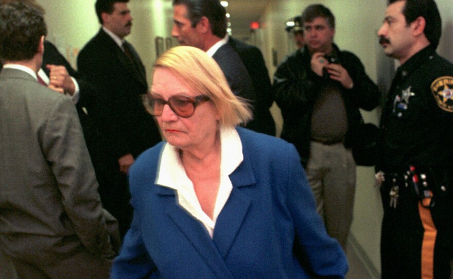 "She was not the kind of person to go away quietly," said an attorney at the non-profit that represented Vera Coking. Here's she's seen walking past Donald Trump, partially in an Atlantic City, N.J. court.