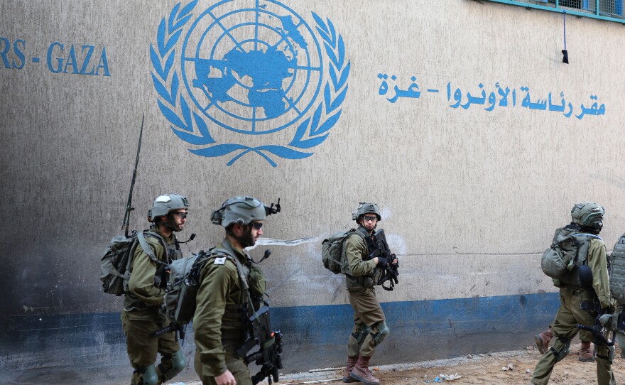 Israeli soldiers inside an evacuated compound of the UNRWA in Gaza City, amid ongoing fighting between Israel and the Palestinian militant group Hamas. This photo was taken during a controlled tour by the Israeli army on Feb. 8 and subsequently edited under the supervision of the Israeli military.