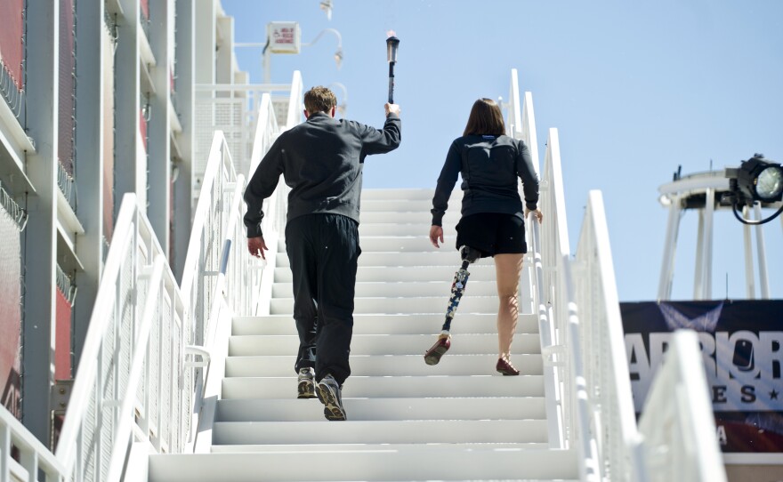 Retired Army veteran Melissa Stockwell and Royal Marine Capt. Simon Maxwell