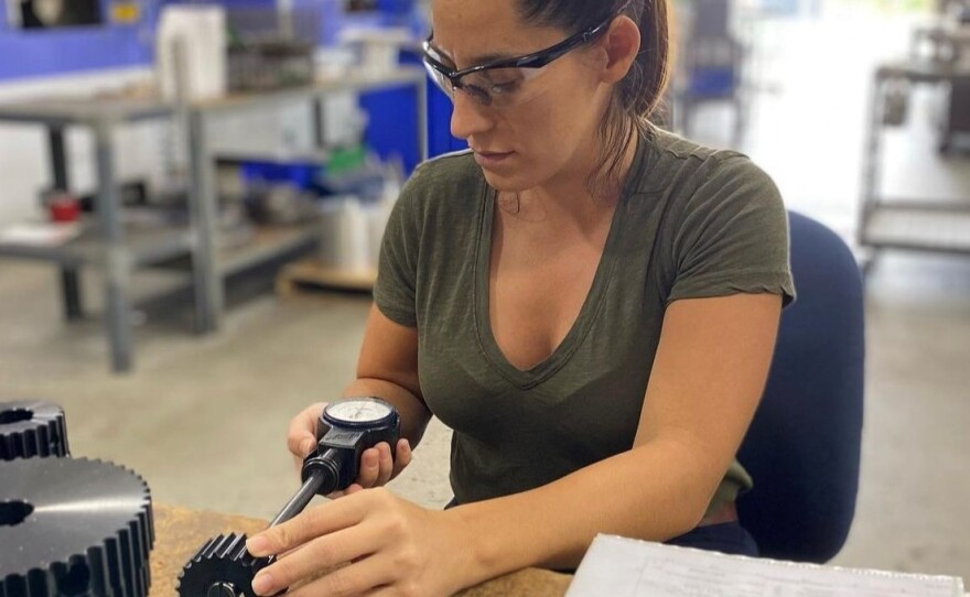 Nicole Wolter at work at her factory in Wauconda, Ill., which makes components for industrial machines. Wolter's company is straining to meet demand as her own suppliers struggle with short staffing.