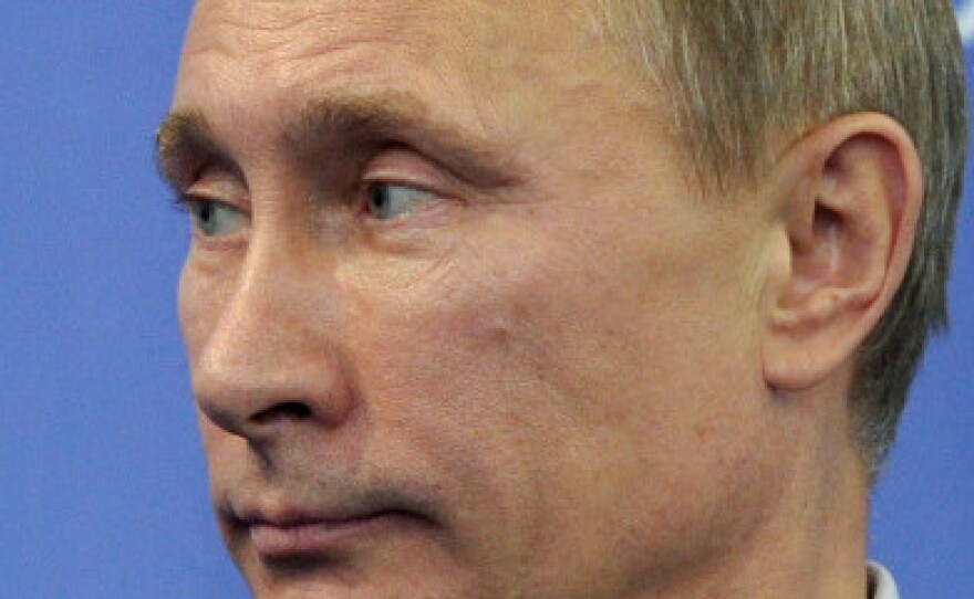 Prime Minister Vladimir Putin visits the headquarters of his United Russia party on Sunday. Though his party did not do as well as it has previously, Putin is still an overwhelming favorite in the presidential election in March.