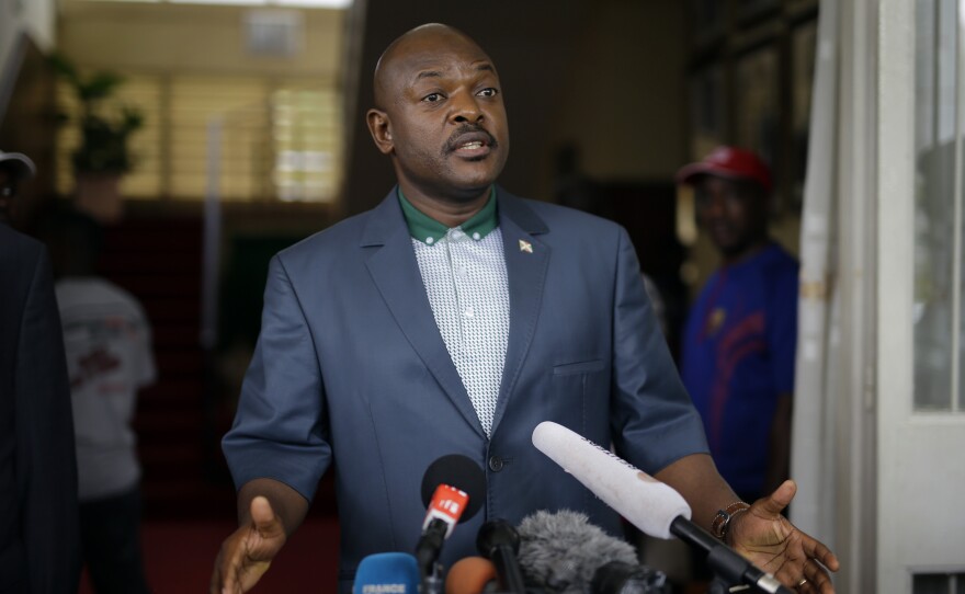 Burundi's President Pierre Nkurunziza speaks at the presidential palace in the capital Bujumbura on May 17, shortly after an attempted coup was quashed. He is running for a third term next month despite a constitutional limit of two terms.