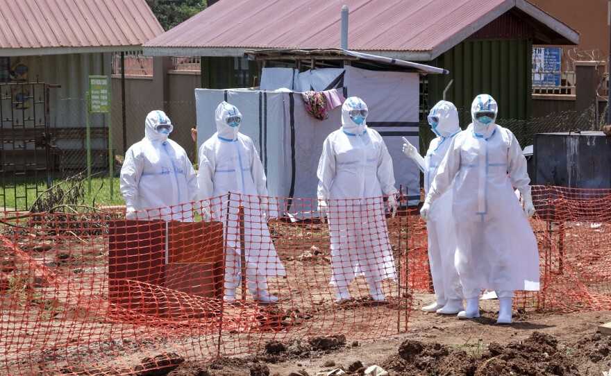 Doctors walk in the Ebola isolation section of Mubende Regional Referral Hospital, in Mubende, Uganda, on Sept. 29. Ugandan health officials have declared an Ebola outbreak in several regions of the country.