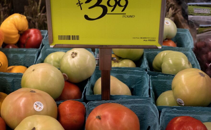 A view of fruit and vegetables at an area grocery store in Washington, D.C., on Aug. 12. Surging prices are hurting households and eroding President Biden's approval rating.
