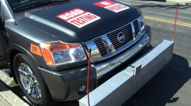 A truck owned by Cartegraph Systems outfitted with a laser sensor that will assess the condition of San Diego's roads. Feb. 17, 2015.