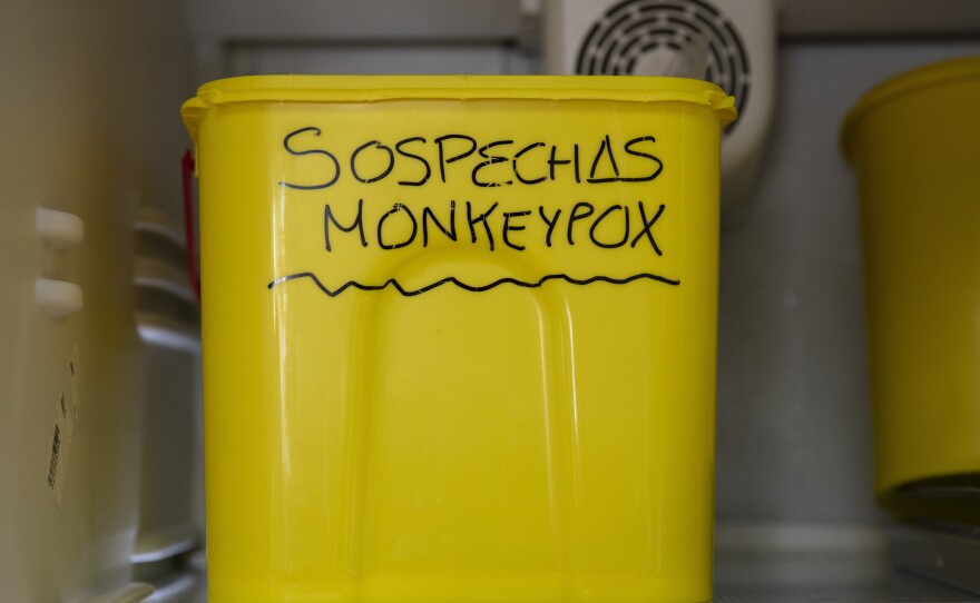 A bucket with suspected monkeypox samples is stored at a laboratory in Spain in June.