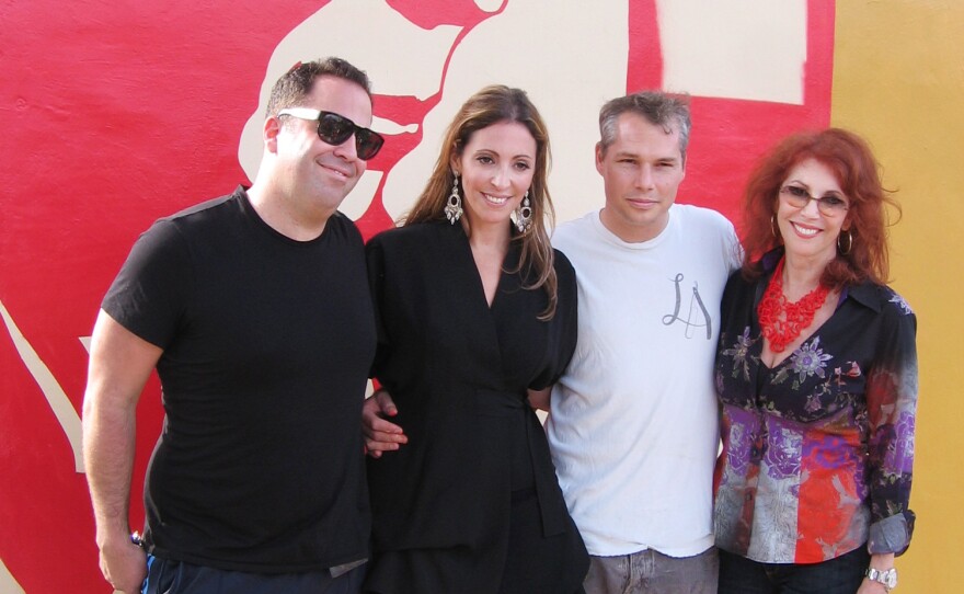 Tony Goldman's son Joey (far left) and daughter Jessica (center) pose with artist Shepard Fairey and their mother, Janet Goldman.