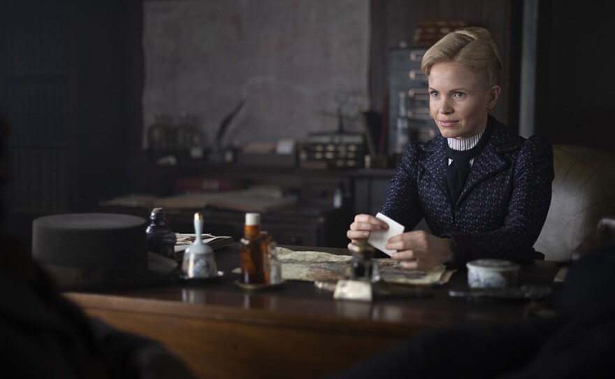Kate Phillips as Eliza Scarlet