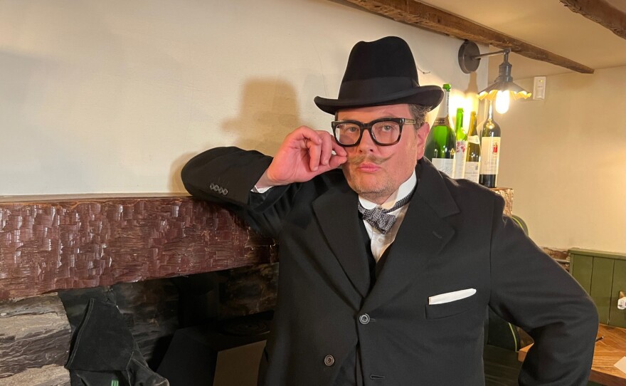 Alan Carr dressed as Poirot