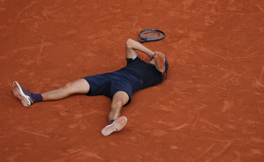 Alexander Zverev of Germany reacts after winning the men's final match against Flavio Cobolli of Italy at the French Open tennis tournament in Paris, Sunday, June 7, 2026.