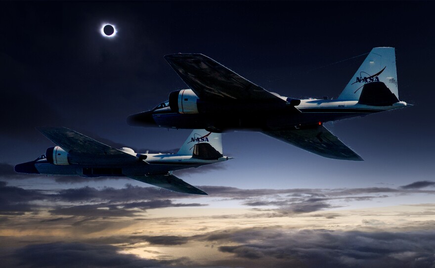 A NASA illustration showing twin WB-57F research planes tracking the eclipse over North America.