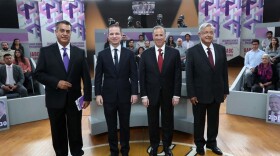 In this photo released by the National Electoral Institute (INE), presidential candidates, from left, independent Jaime Rodriguez, known as "El Bronco," Ricardo Anaya of the Forward for Mexico Coalition, Jose Antonio Meade, of the Institutional Revolutionary Party, and Andres Manuel Lopez Obrador, with the MORENA party, attend the second of three debates in Tijuana, Mexico, Sunday, May 20, 2018. 