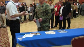 Master Gunnery Sergeant Damon Bitts, speaking to the recruiter for Lockheed Martin at the Military.com Jobs Fair, March 8th 2011. 