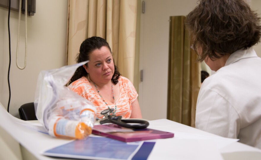 Just a week after her heart attack, Kathyrn Shiflett meets with Dr. Ellen Keeley, a U.Va. cardiologist, to learn more about the next steps in healing.