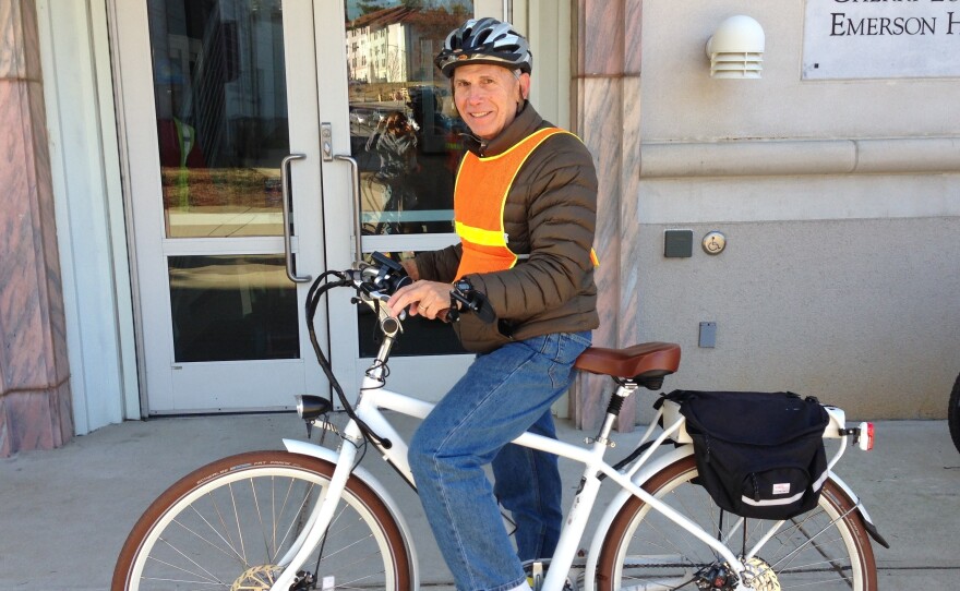 Joel Bowman, 66, rides his e-bike six miles daily to his job at Emory University in Atlanta.