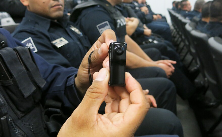 Tijuana police get a look at the new body cameras that will be introduced to the force.