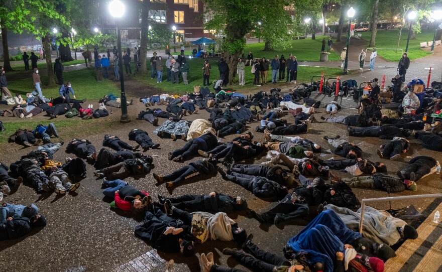 A "Die In" was held in from of Portland State University's Branford Price Millar Library, on May 1. As people laid on the ground, names of some children who have been killed in Palestine were read over a megaphone.