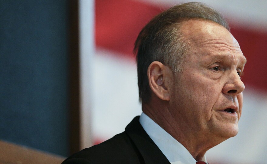 Former Alabama Chief Justice and U.S. Senate candidate Roy Moore debates with Sen. Luther Strange in Montgomery, Ala., on Thursday.